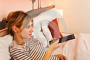 Girl Watching TV in Bed