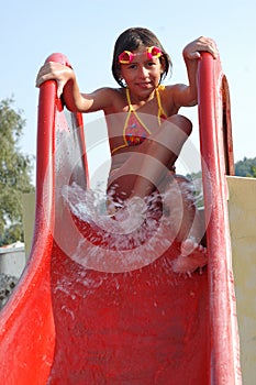 Girl on water slide