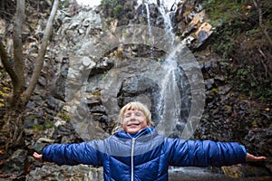 Girl at waterfall