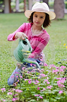 Girl with watering-can