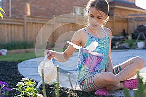 Girl Watering Plants