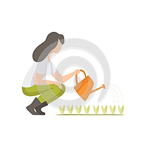 Girl watering seedlings with a watering can, woman working in the garden, worker growing agricultural products vector