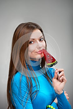 Girl with a watermelon lollipop