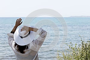 Girl waving from back