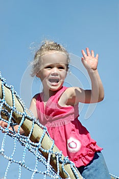 Girl waving hand