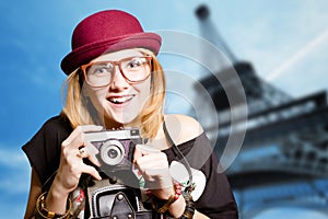 Girl wearing hipster glasses making selfie in