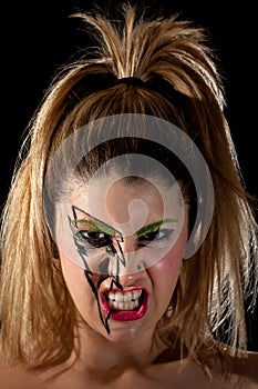 Girl Wearing Lightning Makeup Making Scary Scowl