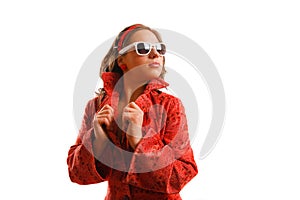 Girl wearing red jacket and sunglasses