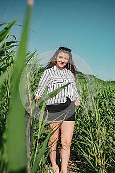 Girl wearing a striped shirt at Reed National Reservation, Sic Village, Romania