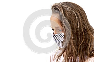 Girl wearing stylish protective face mask on white background with copy space