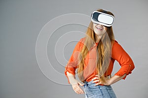 Girl wearing virtual reality goggles.