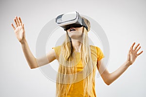 Girl wearing virtual reality goggles