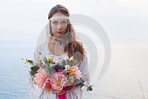 Girl with a wedding bouquet boho style