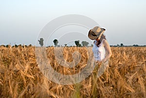 Girl in wheat field