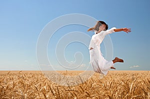 Girl on wheat field