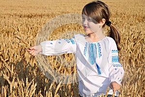 Girl on wheat field