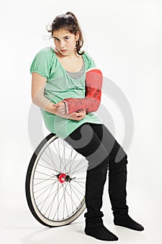 Girl with wheel and plaster cast