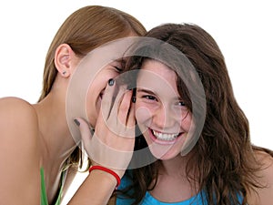 Girl Whispering in Friend`s Ear