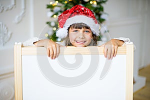 Girl with white board, Christmas