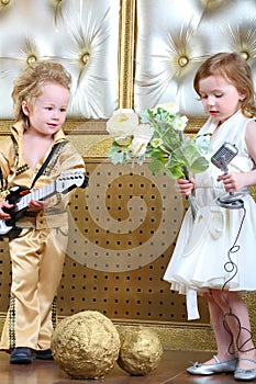 Girl in white dress with flowers and pop musician