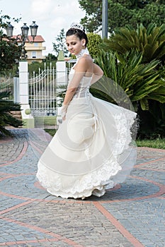 Girl with white dress that makes a turnaround