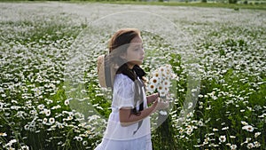 Girl in a white dress of seven years with big eyes