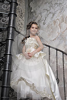 Girl in a white elegant Victorian dress