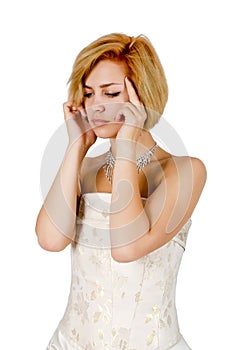 Girl in a white evening dress and necklace