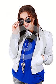 Girl with white jacket and sunglasses.