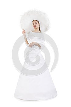 Girl in white long dress and big hat.