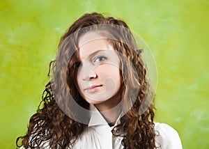 Girl in white shirt over green