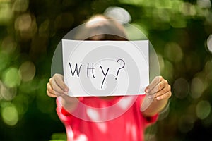 Girl with Why sign