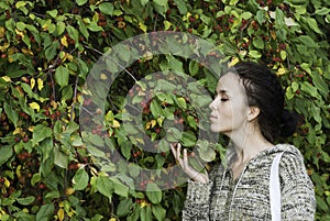 Girl and wild apple tree