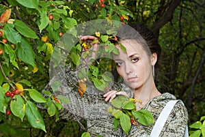 Girl and wild apple tree