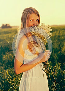 Girl with wildflowers