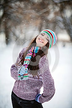 Girl in winter forest