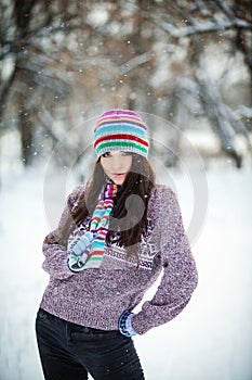 Girl in winter forest