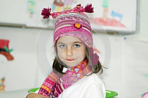 Girl with winter hat and scarf