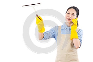 Girl wipe glass by holding a wiper