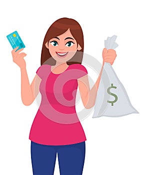 Girl/woman/female holding or showing credit, debit or ATM bank card & money, cash/currency note bag with dollar sign. Modern.