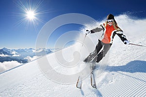 Girl / Woman / Female On the Ski at sunny day