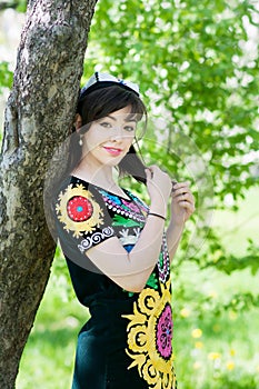 Girl, woman in national historicTajik costume. Central Asia