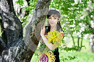 Girl, woman in national historicTajik costume. Central Asia