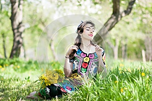 Girl, woman in national historicTajik costume. Central Asia