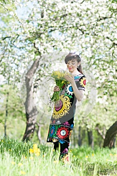 Girl, woman in national historicTajik costume. Central Asia