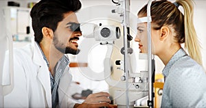 Girl woman in ophthalmology clinic for diopter detection