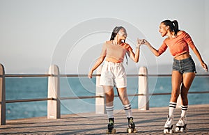 Girl, women or friends roller skate on sea, water or ocean sidewalk together for fun travel and relax adventure ride