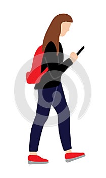 Girl or women is holding smartphone dressed in casual style walk