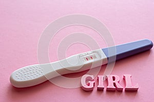 Girl words, positive pregnancy test