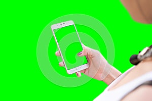 Girl work on smart phone. Isolated in green. Mockup for video editors photo